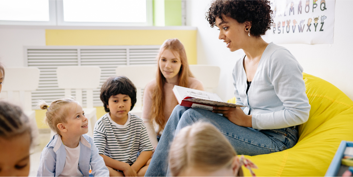 Teacher reading from a book