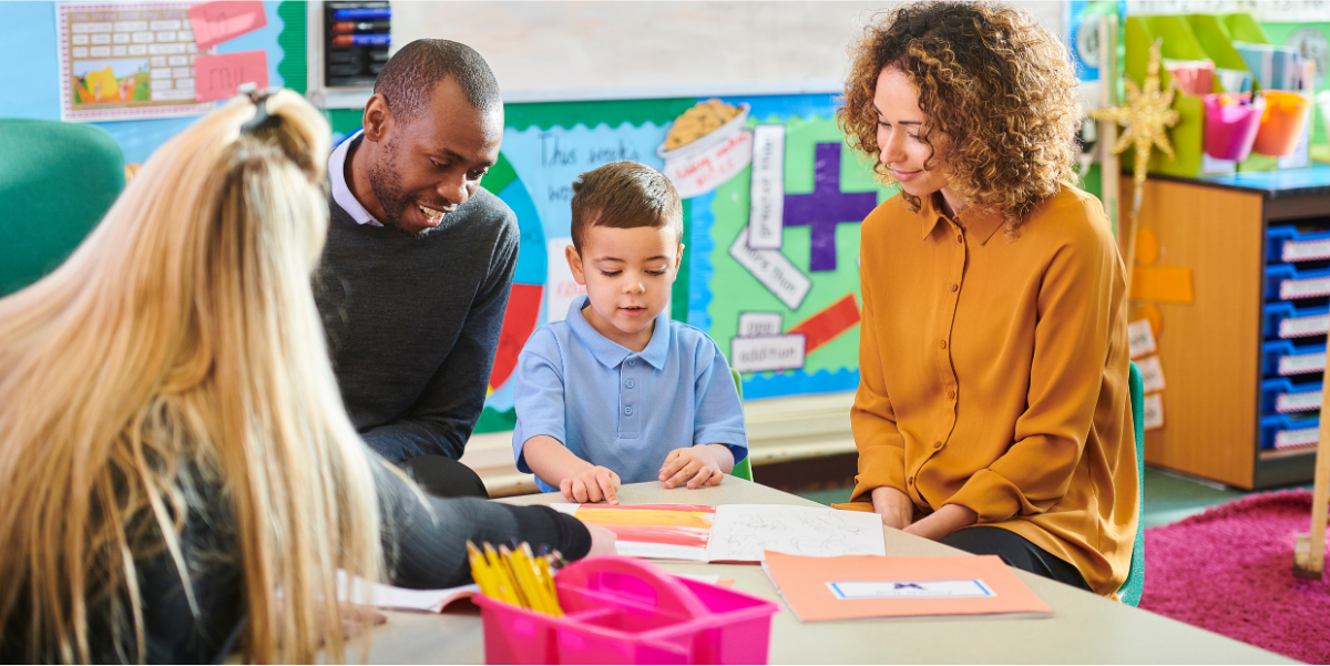 Parents in classroom with teacher